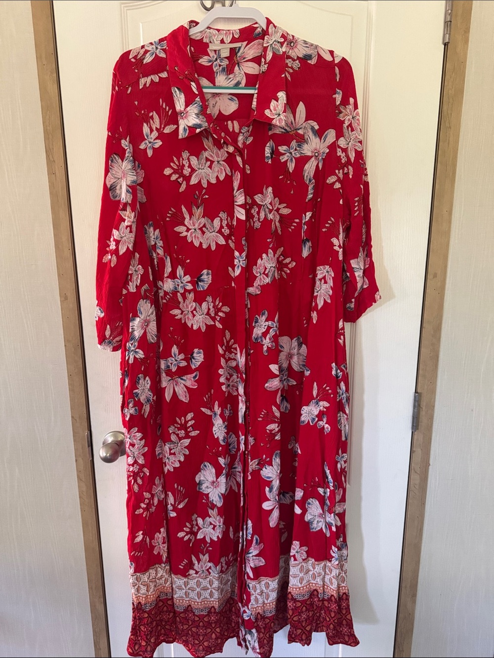 Woman Within Red Floral Dress with Button Detail